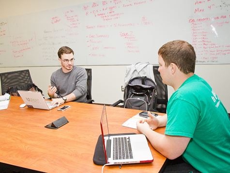 a tutor helping a student